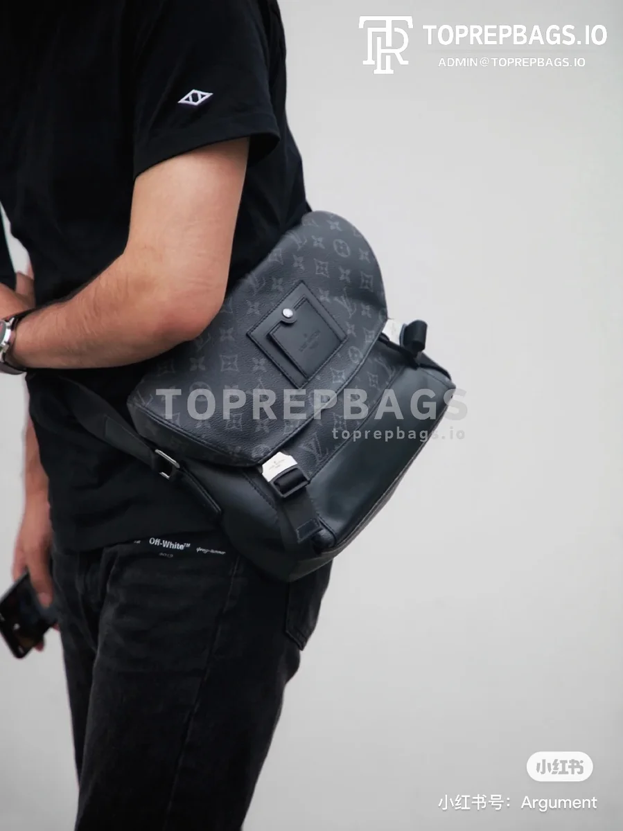 a1609321932762_1717 Louis Vuitton Voyager Messenger in Black