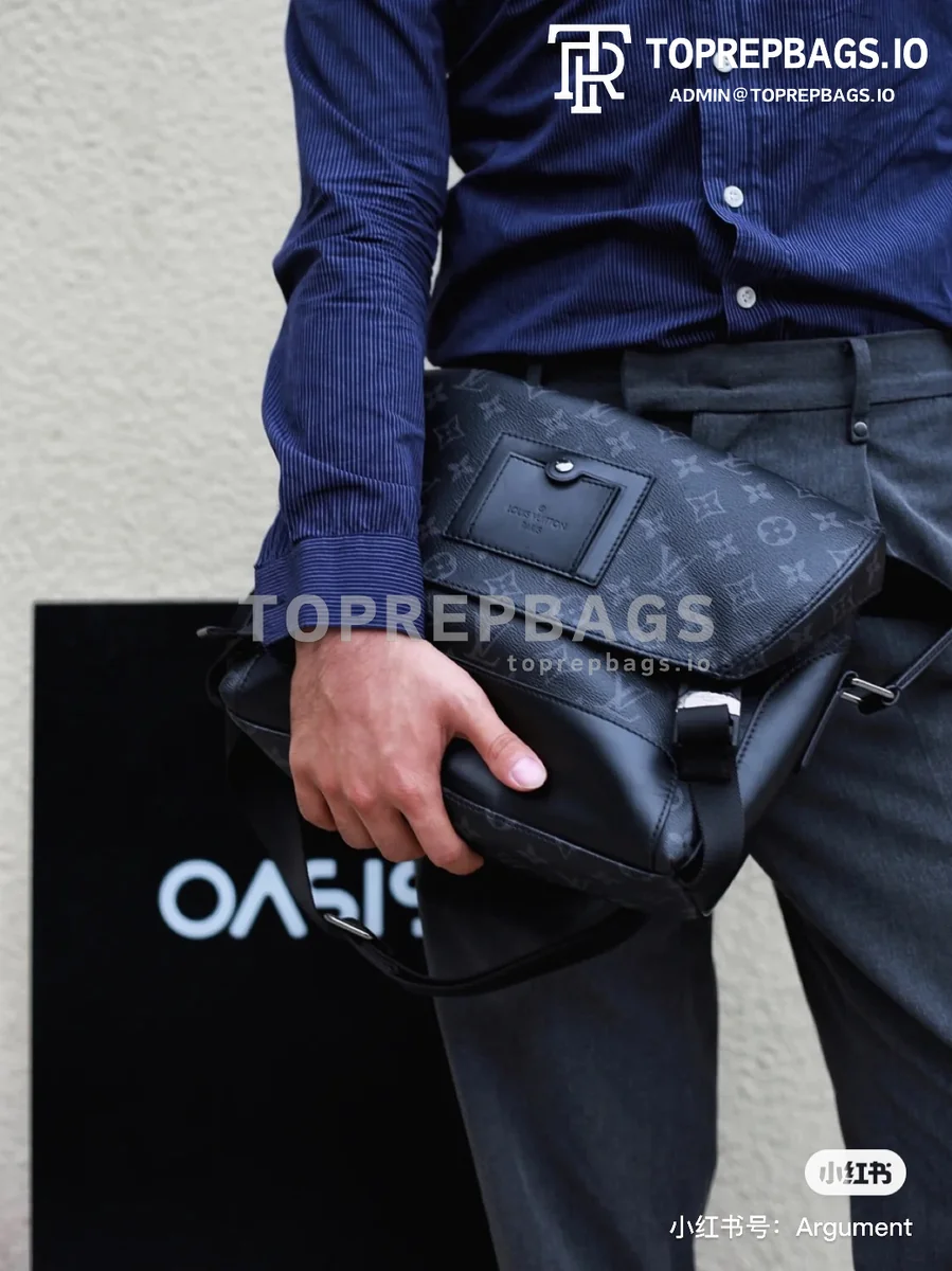 a1609321933354_4272 Louis Vuitton Voyager Messenger in Black