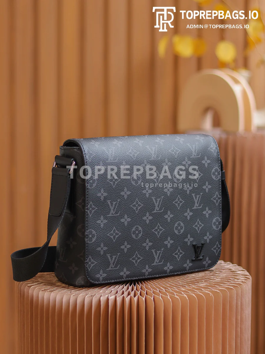 a1627890194566_5288 Louis Vuitton District PM Messenger in Black