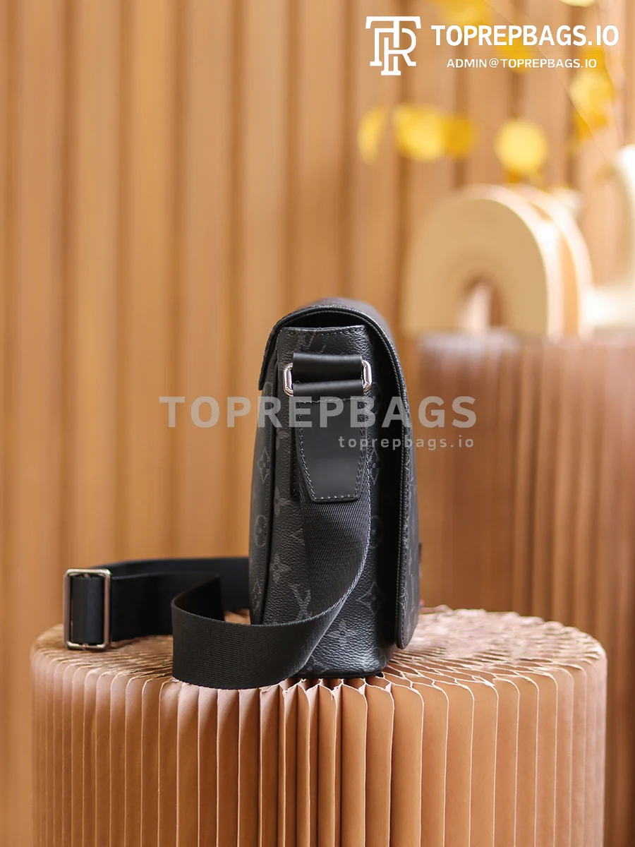 a1627890194567_2575 Louis Vuitton District PM Messenger in Black