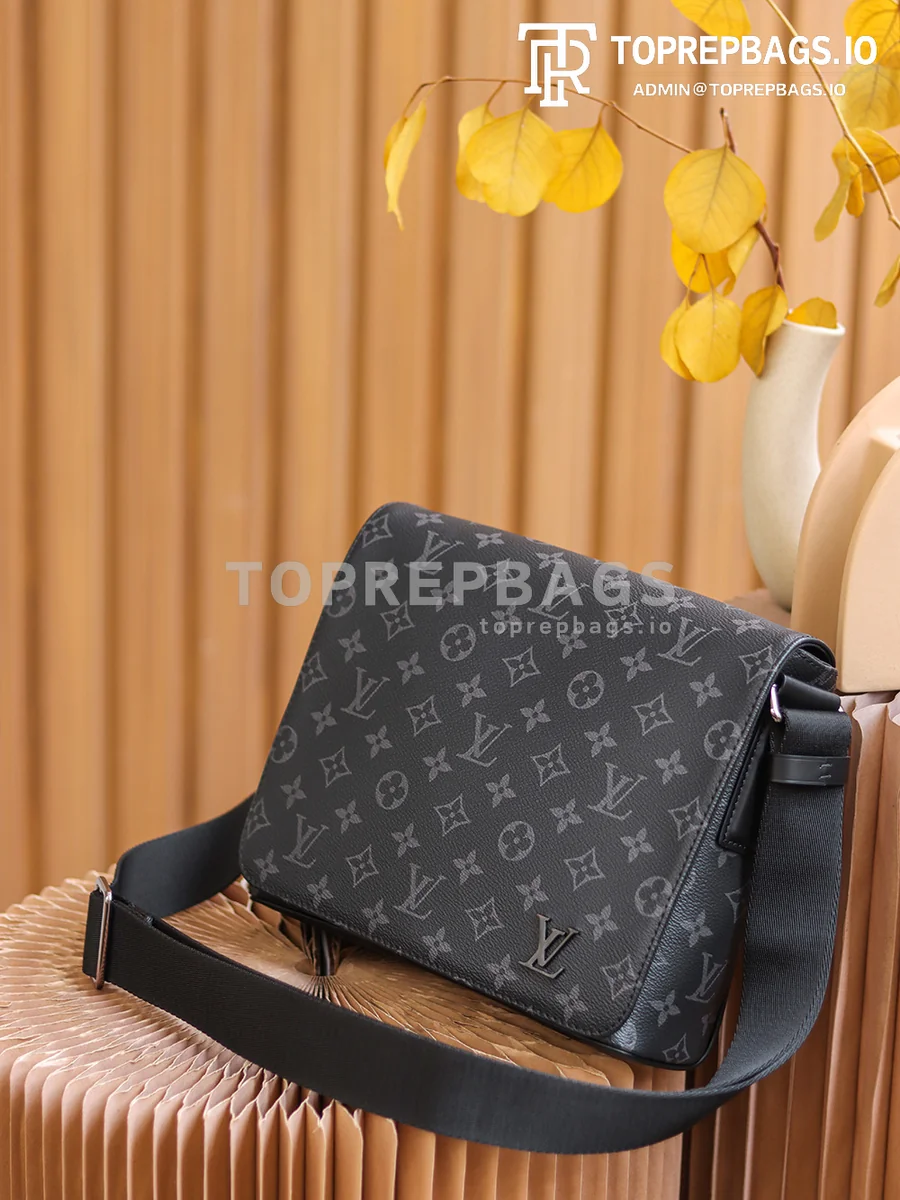 a1627890194569_7627 Louis Vuitton District PM Messenger in Black