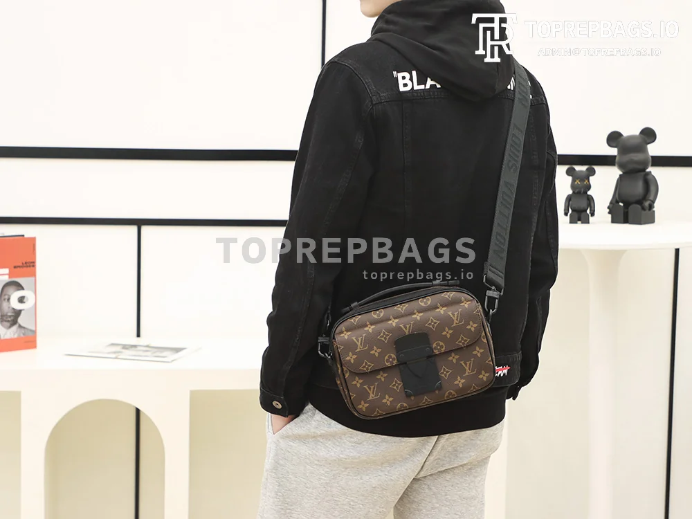 a1640163417700_5784 Louis Vuitton S Lock Messenger in Brown