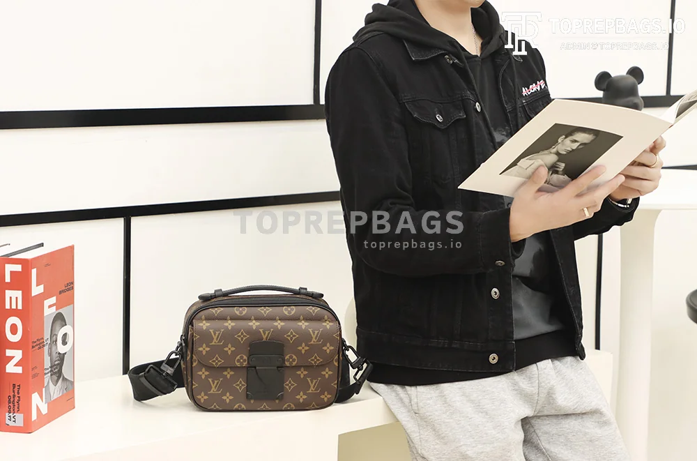 a1640163417702_7111 Louis Vuitton S Lock Messenger in Brown