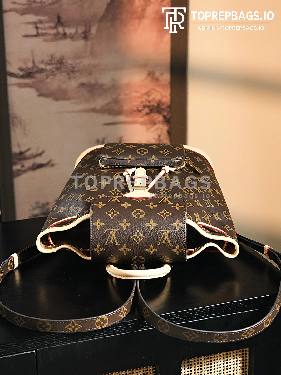a1722602769487_4787 Louis Vuitton Montsouris in Brown