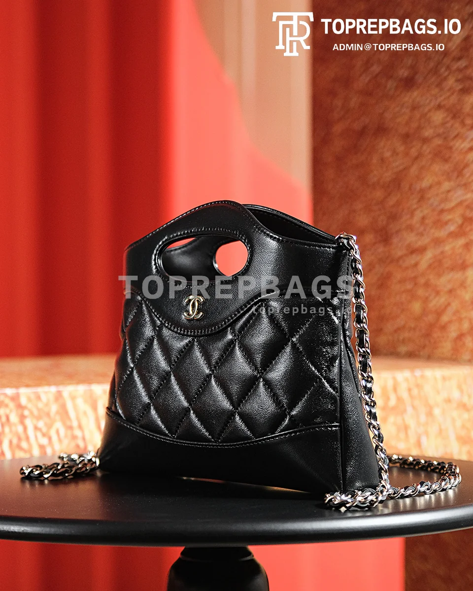 a1722603159267_4522 Chanel 31 Bag Nano in Black