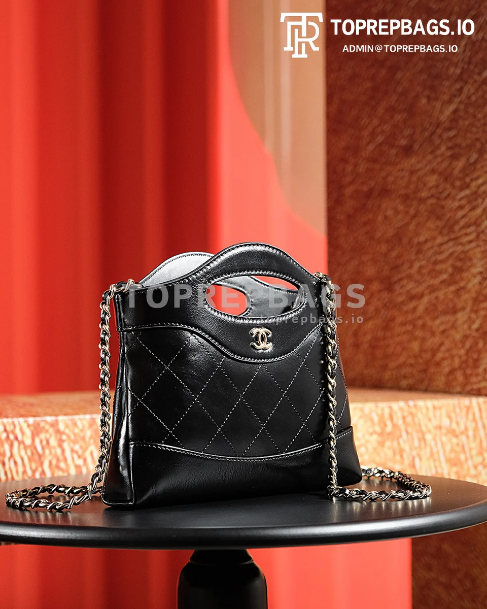 a1722603645457_6043 Chanel 31 Bag Nano in Black