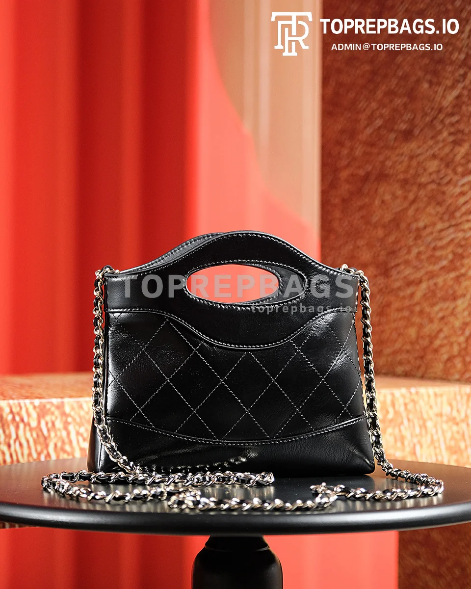 a1722603645461_3047 Chanel 31 Bag Nano in Black