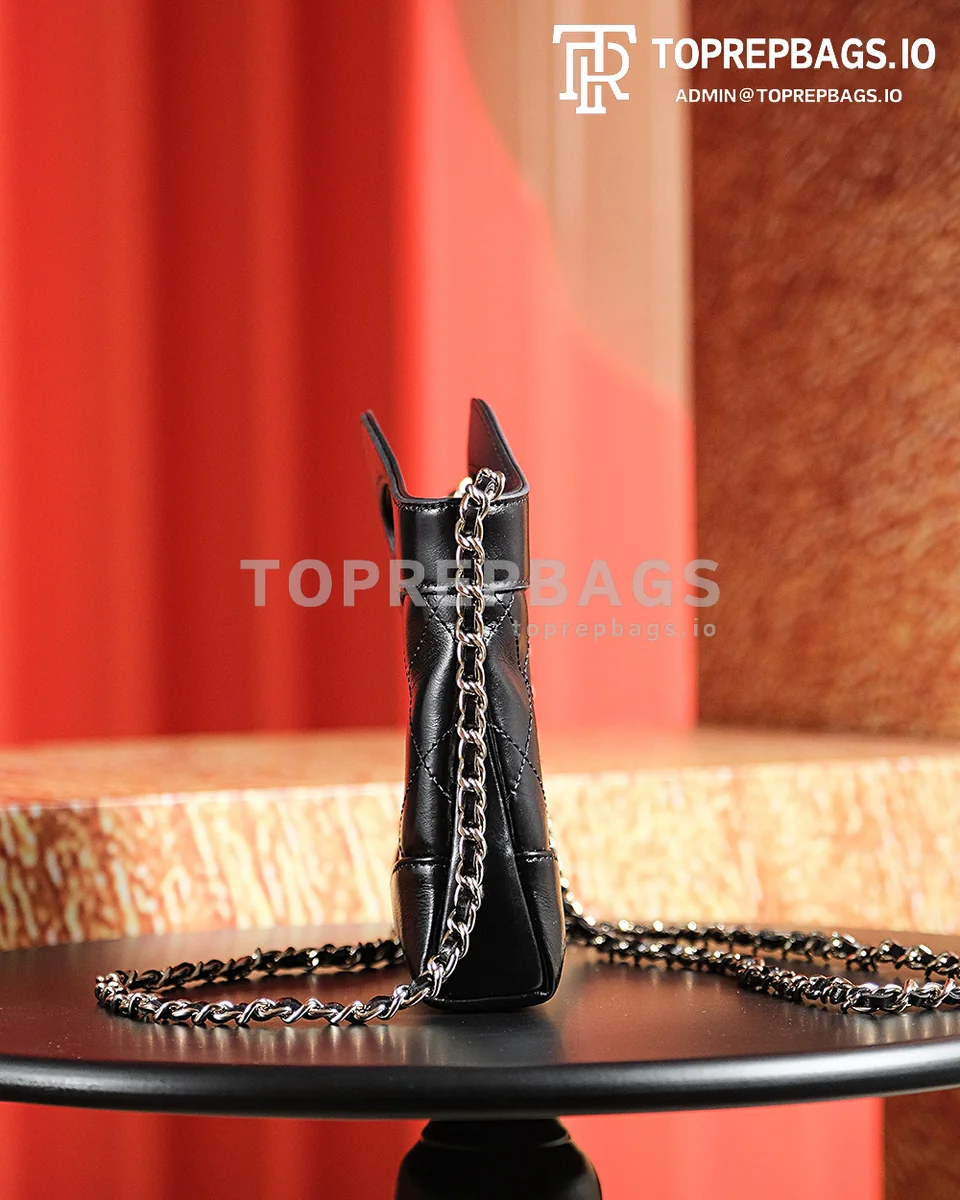 a1722603645462_7404 Chanel 31 Bag Nano in Black
