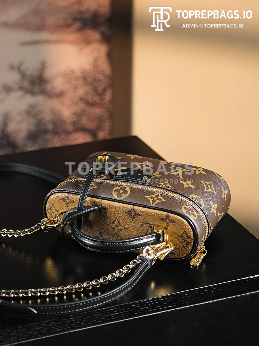 a1723208613858_1331 Louis Vuitton Vanity Chain Pouch in Brown