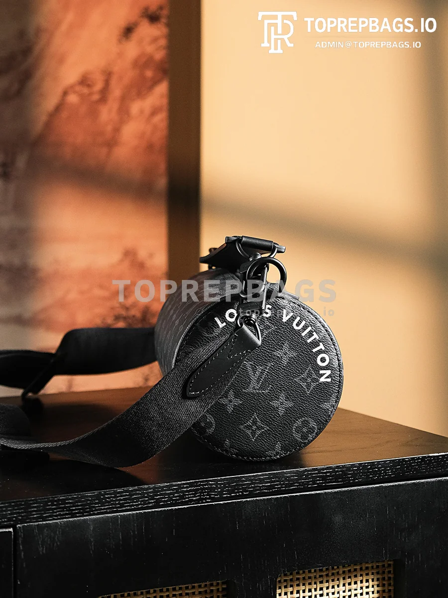 a1724655039150_7650 Louis Vuitton Soft Polochon Small in Black