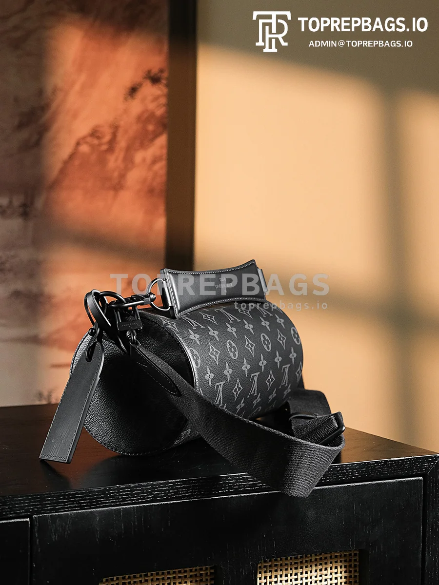 a1724655044235_5105 Louis Vuitton Soft Polochon Small in Black
