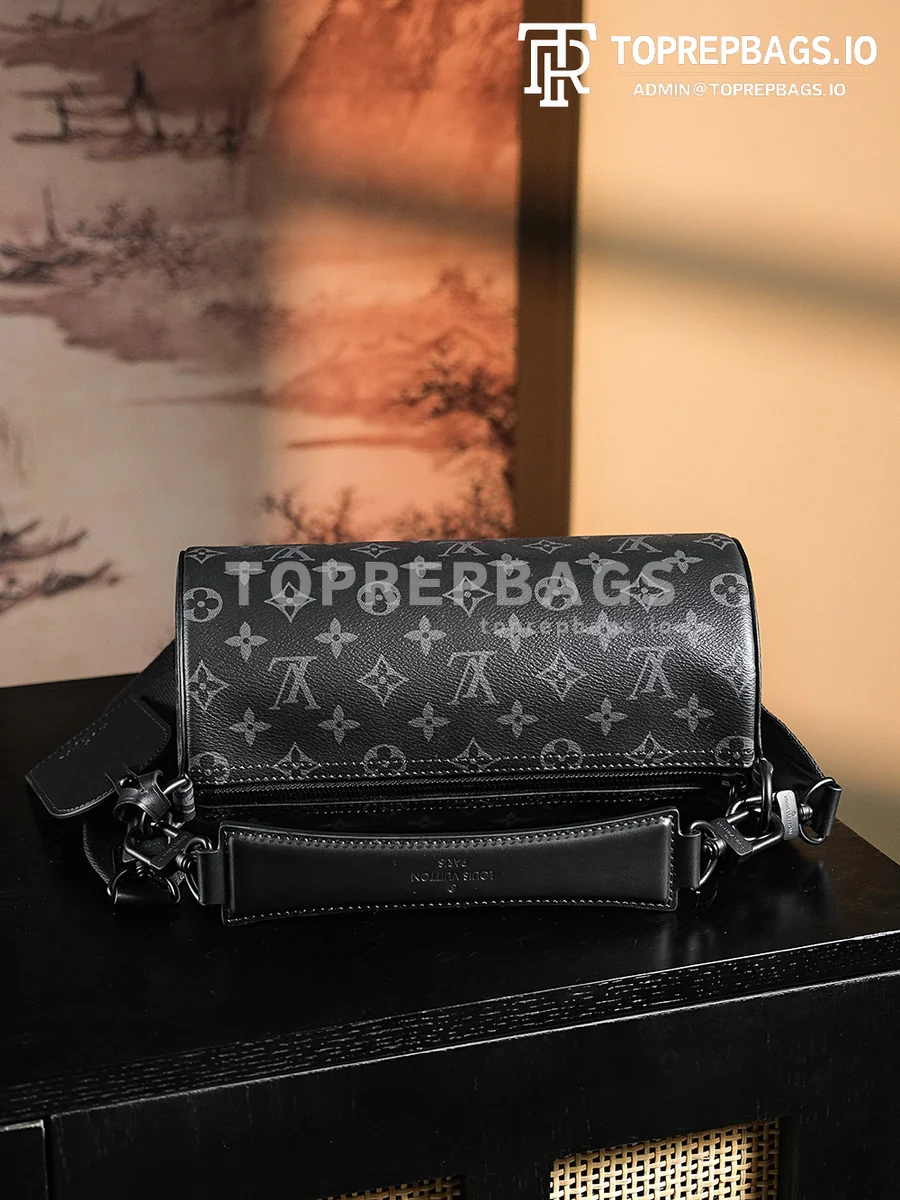 a1724655044240_7066 Louis Vuitton Soft Polochon Small in Black