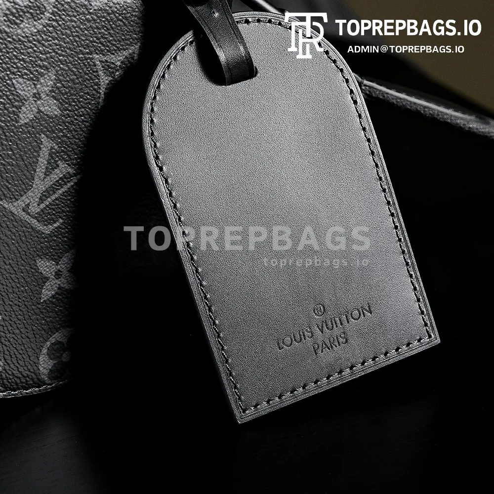 a1724655078160_1305 Louis Vuitton Soft Polochon Small in Black