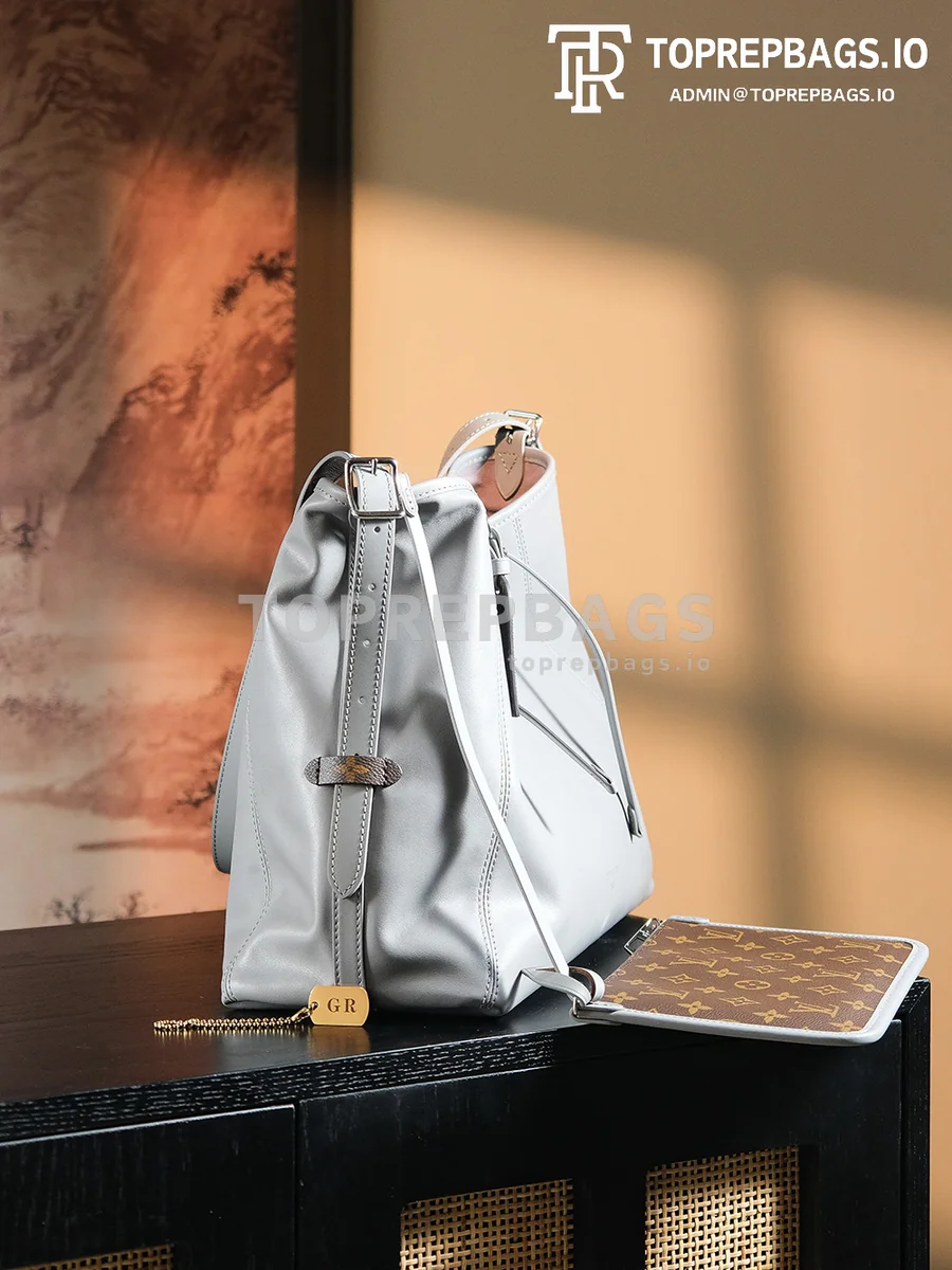 a1724852060149_1576 Louis Vuitton CarryAll in Grey
