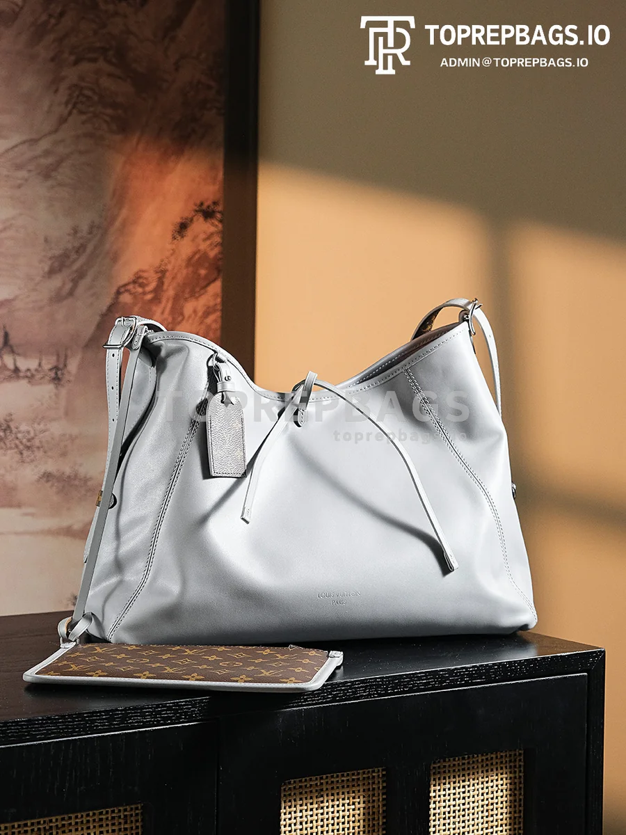 a1724852060150_5563 Louis Vuitton CarryAll in Grey