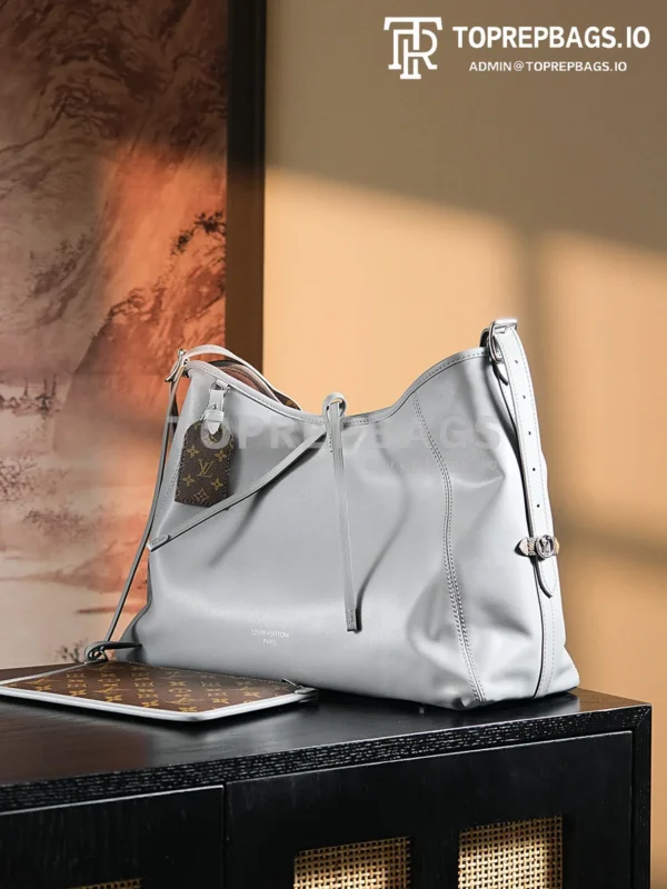 a1724852060156_8303 Louis Vuitton CarryAll in Grey