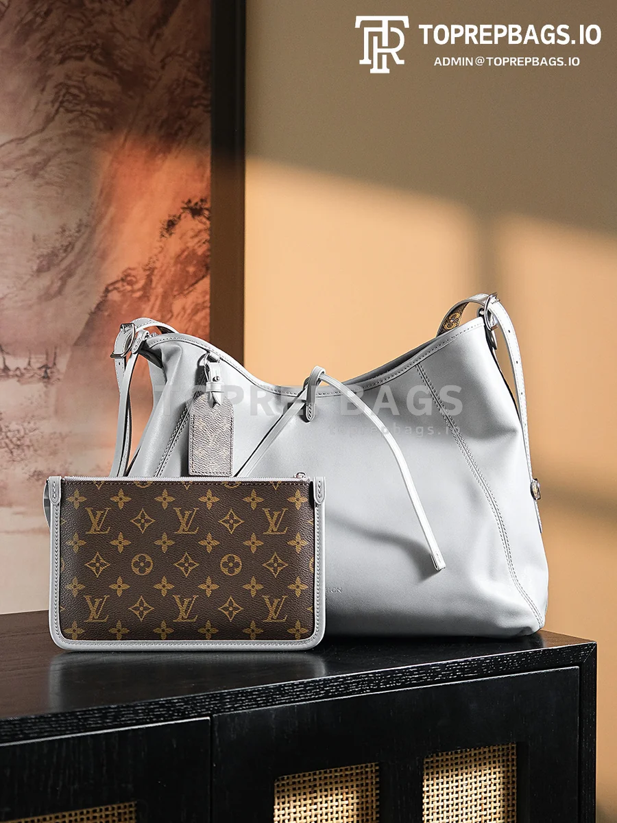 a1724852060160_2673 Louis Vuitton CarryAll in Grey