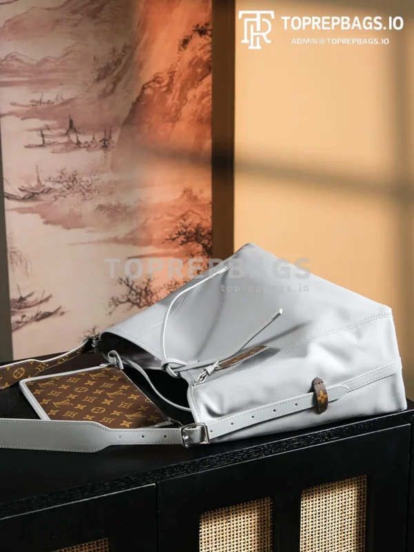 a1724852062100_8870 Louis Vuitton CarryAll in Grey