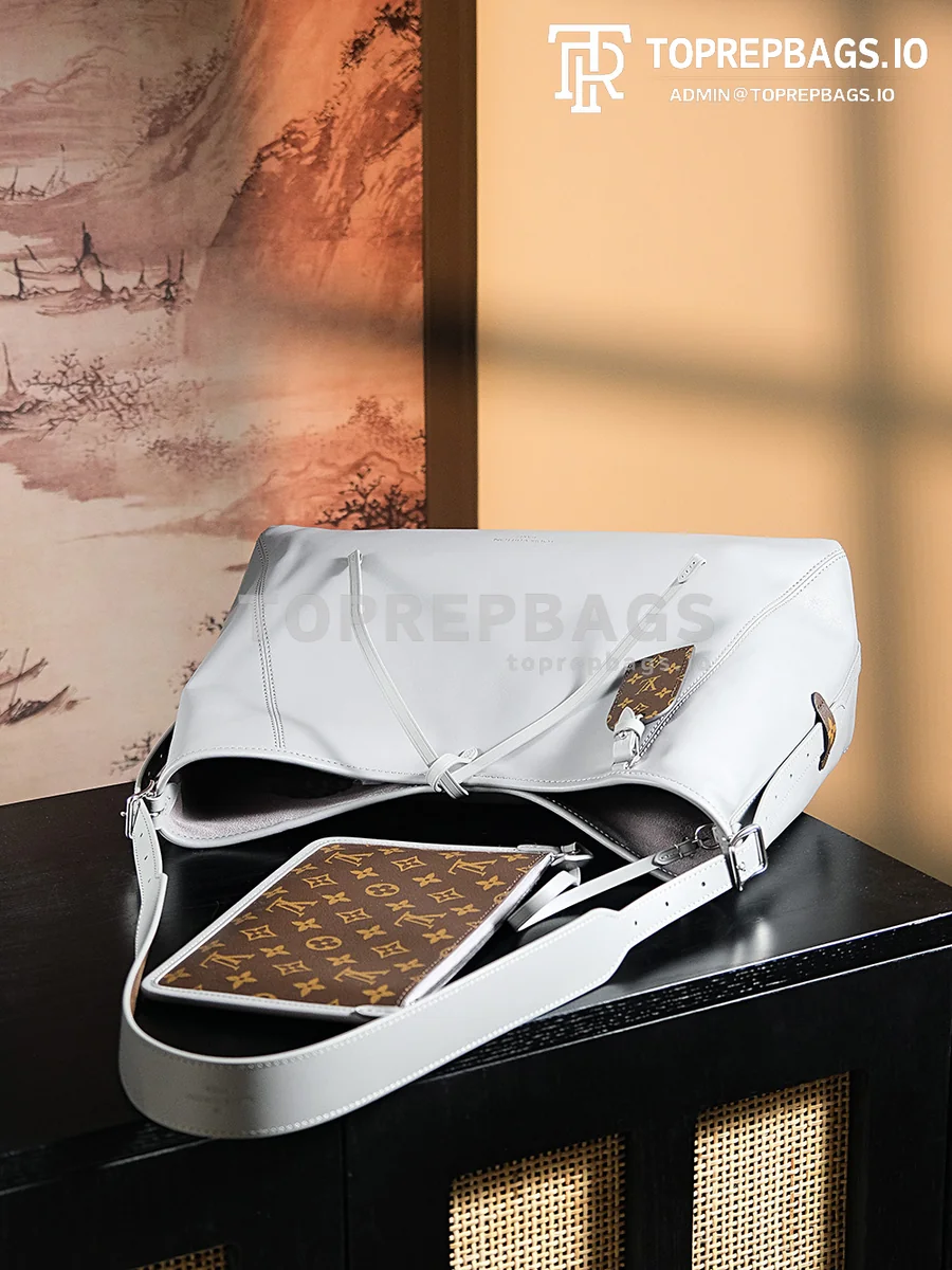 a1724852062101_7677 Louis Vuitton CarryAll in Grey