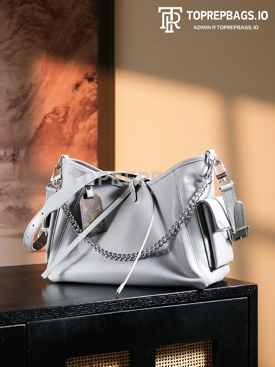 a1724852309613_1404 Louis Vuitton CarryAll in Grey