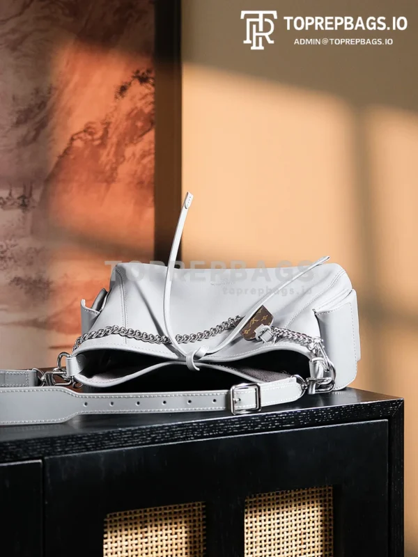 a1724852313060_3543 Louis Vuitton CarryAll in Grey