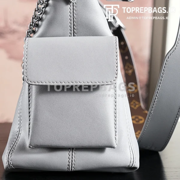 a1724852353624_7052 Louis Vuitton CarryAll in Grey