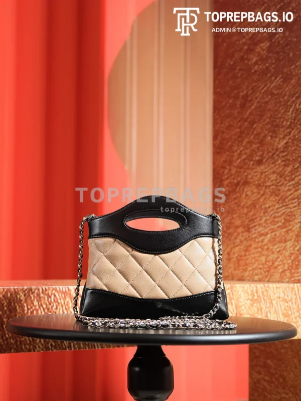 a1725980493307_5517 Chanel 31 Bag Nano in Black/Beige