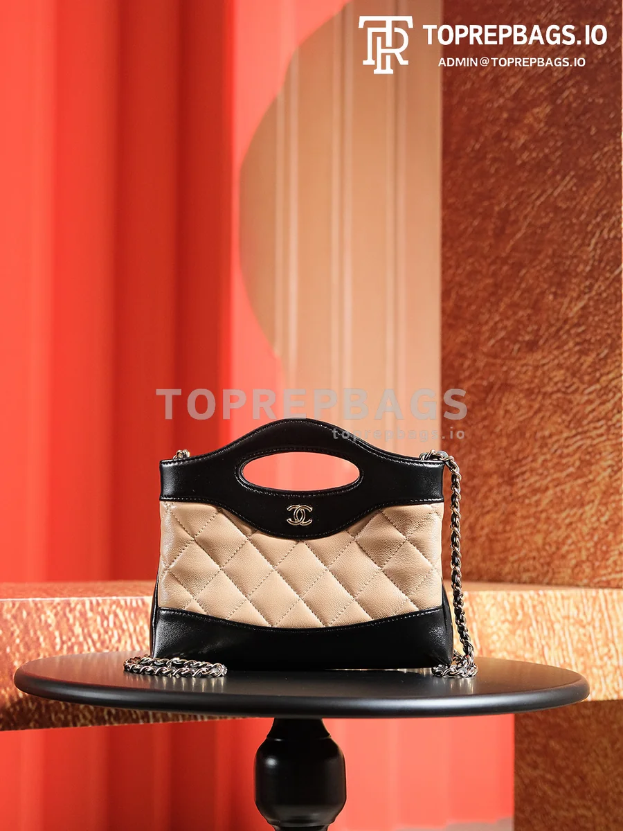 a1725980493309_6664 Chanel 31 Bag Nano in Black/Beige