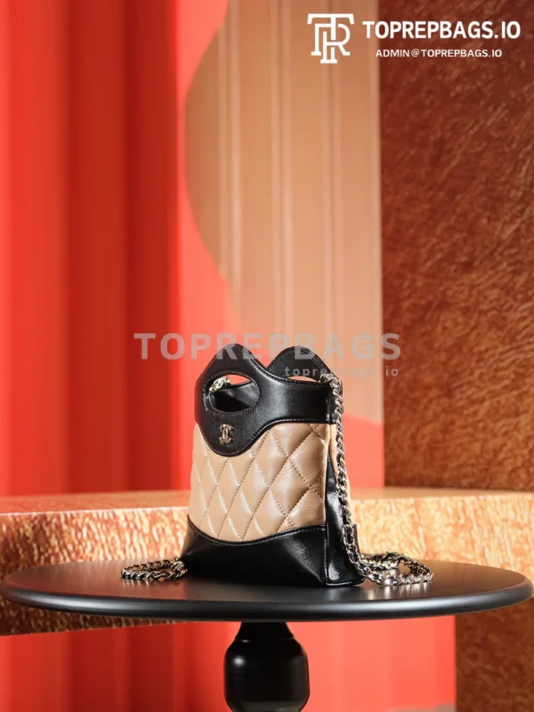 a1725980493313_2817 Chanel 31 Bag Nano in Black/Beige