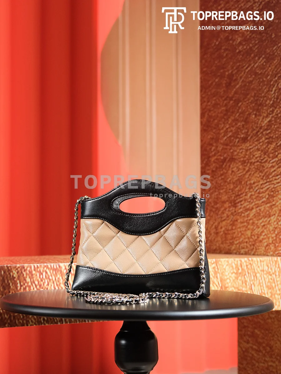 a1725980493314_5048 Chanel 31 Bag Nano in Black/Beige