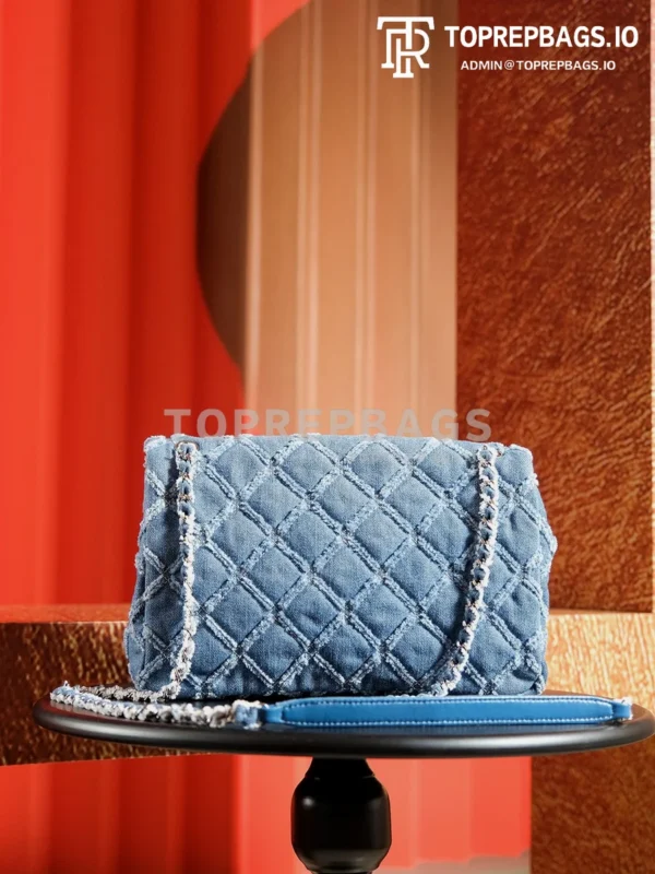 a1727266548760_2574 Chanel Classic Flap in Blue