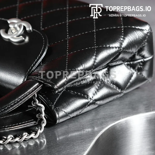 a1731924880076_3433 Chanel Kelly 25C in Black