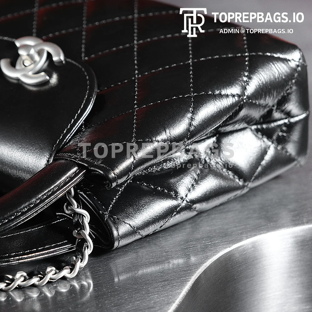 a1731924880076_3433 Chanel Kelly 25C in Black
