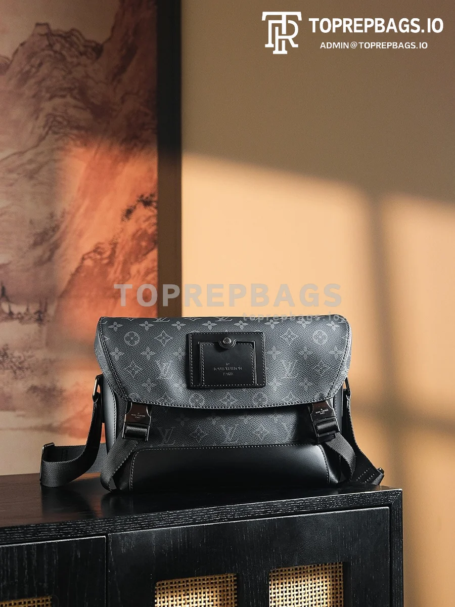 a1734520936580_2725 Louis Vuitton Voyager Messenger in Black