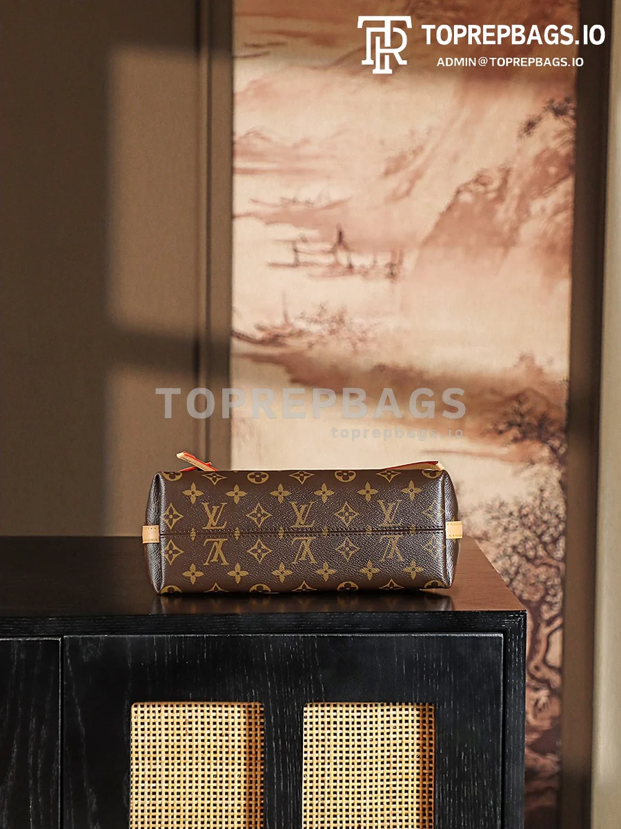 a1737354607085_7520 Louis Vuitton CarryAll in Brown