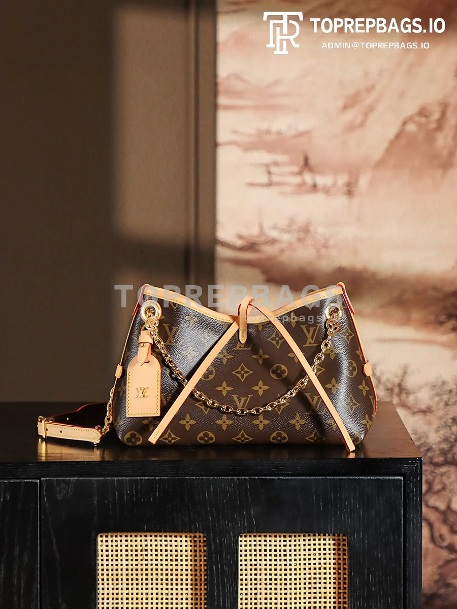 a1737354607120_7351 Louis Vuitton CarryAll in Brown