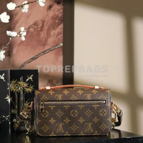 Louis Vuitton Pochette Metis Hobo in Brown