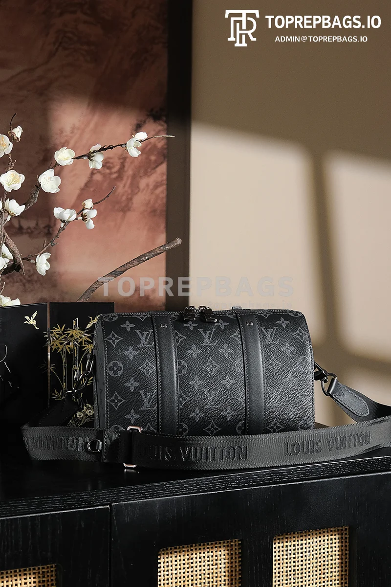 a1743068148660_6048 Louis Vuitton Keepall in Black