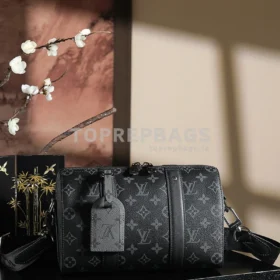 a1743068148667_4641 Louis Vuitton Keepall in Black