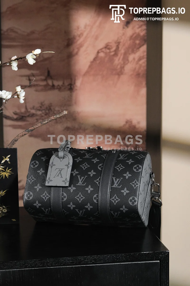 a1743068148668_5645 Louis Vuitton Keepall in Black