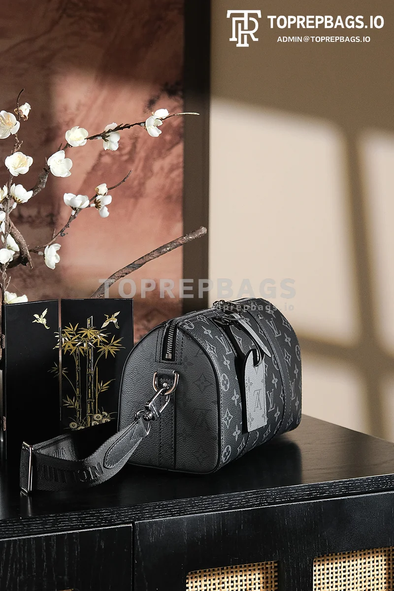 a1743068148672_5475 Louis Vuitton Keepall in Black