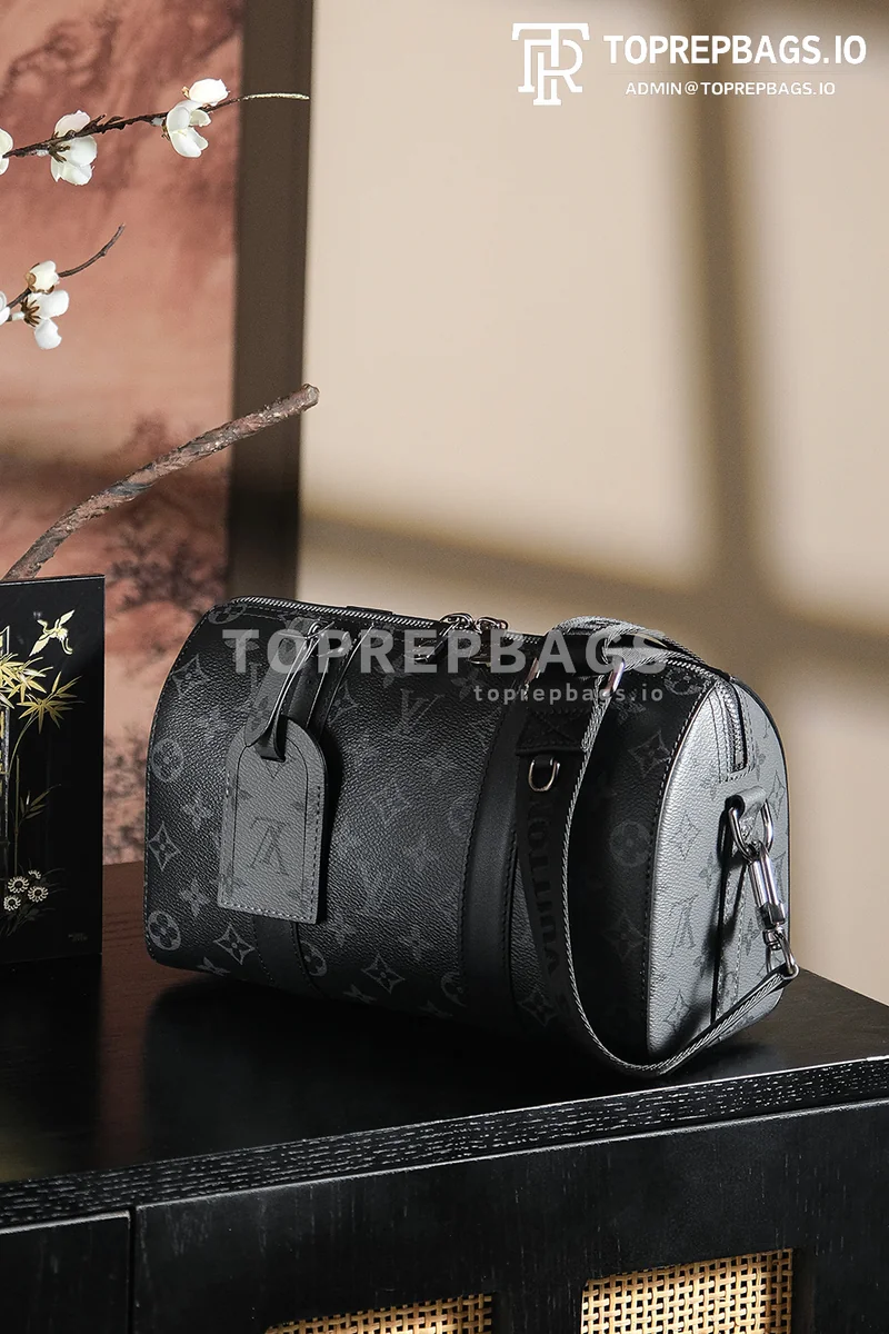 a1743068151113_2162 Louis Vuitton Keepall in Black