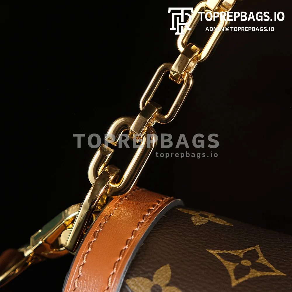 a1745829555100_0310 Louis Vuitton Dauphine MM in Brown