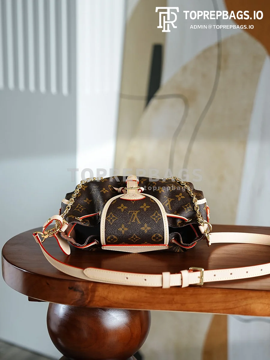 i1755227447854_8146_0_4 Louis Vuitton Odyssee in Brown