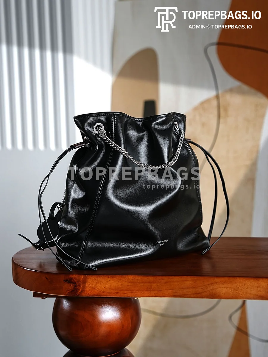 i1756799013748_2307_0_1 Louis Vuitton Off Duty Vibe Medium in Black