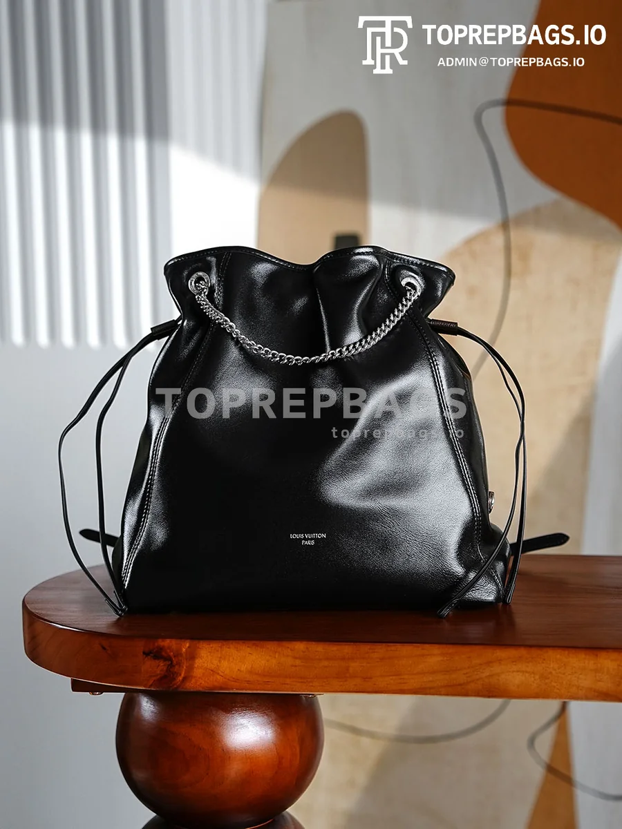 i1756799014463_248_0_0 Louis Vuitton Off Duty Vibe Medium in Black