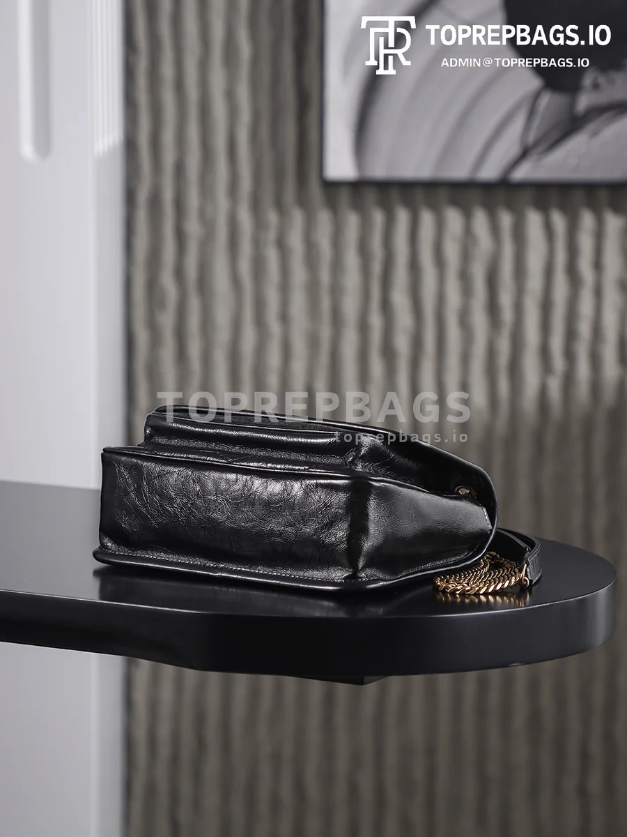 i1758626440559_2874_0_7 YSL Niki in Black
