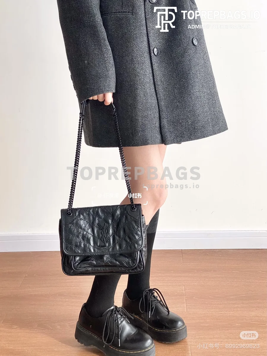 i1758628671259_6061_0_0 YSL Niki in Black