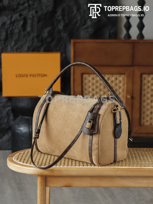 i1764672454011_9730_0_1 Louis Vuitton Express Medium in Brown