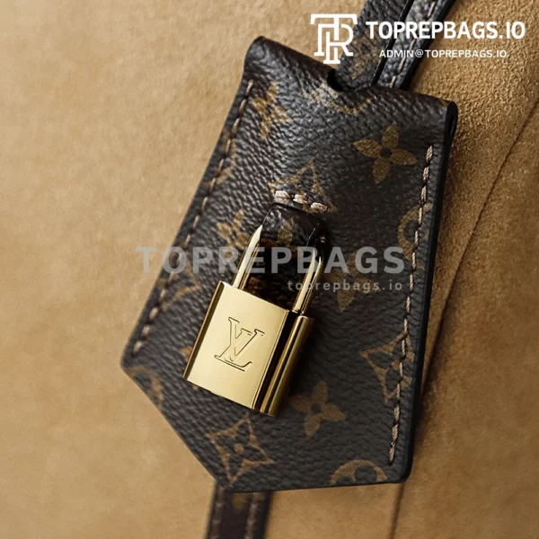 i1764672512172_4720_0_0 Louis Vuitton Express Medium in Brown